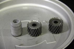 Helical gears manufactured using a new method of vibration press